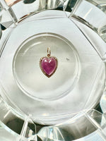 Carved heart charm